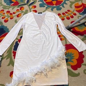 white long sleeve with feathers